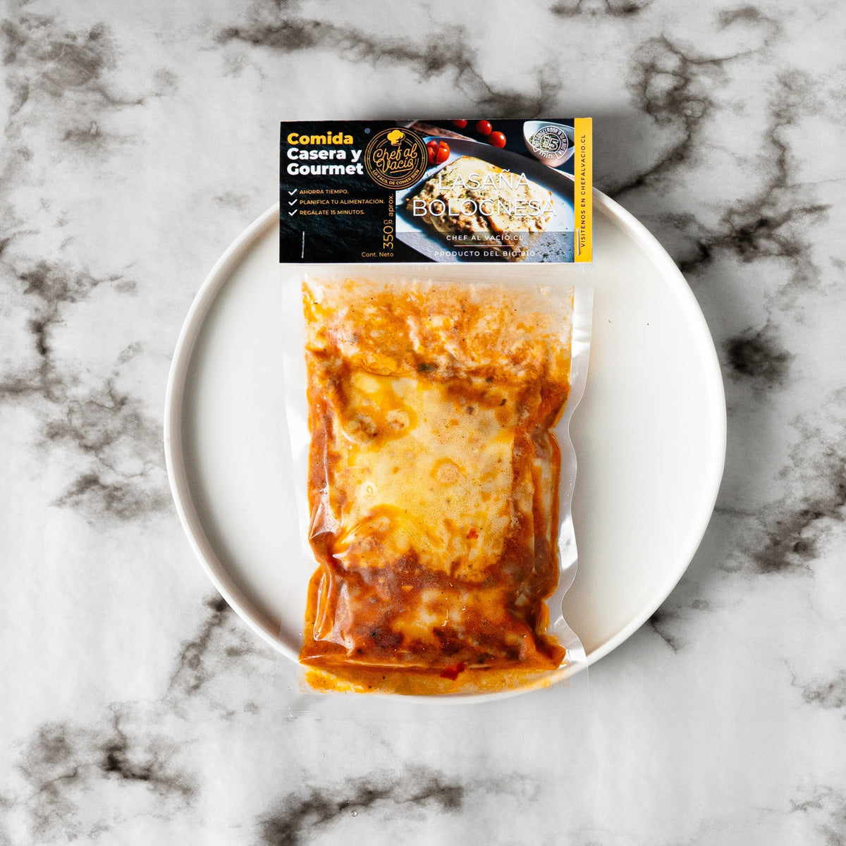 Lasaña boloñesa con bechamel y queso gratinado, comida a domicilio
